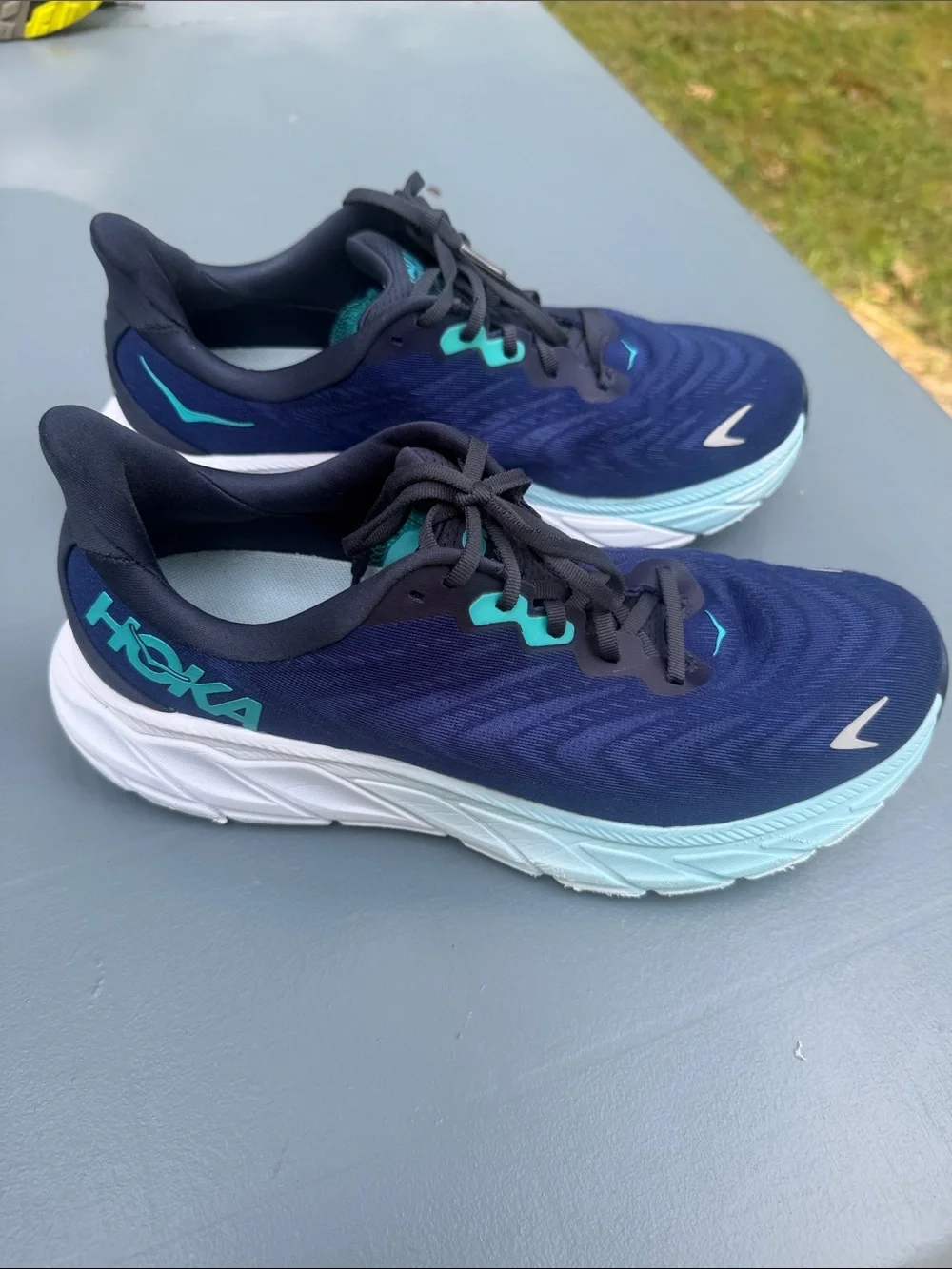 Hoka Navy Running Shoes with Aqua Accents. Wide shoes